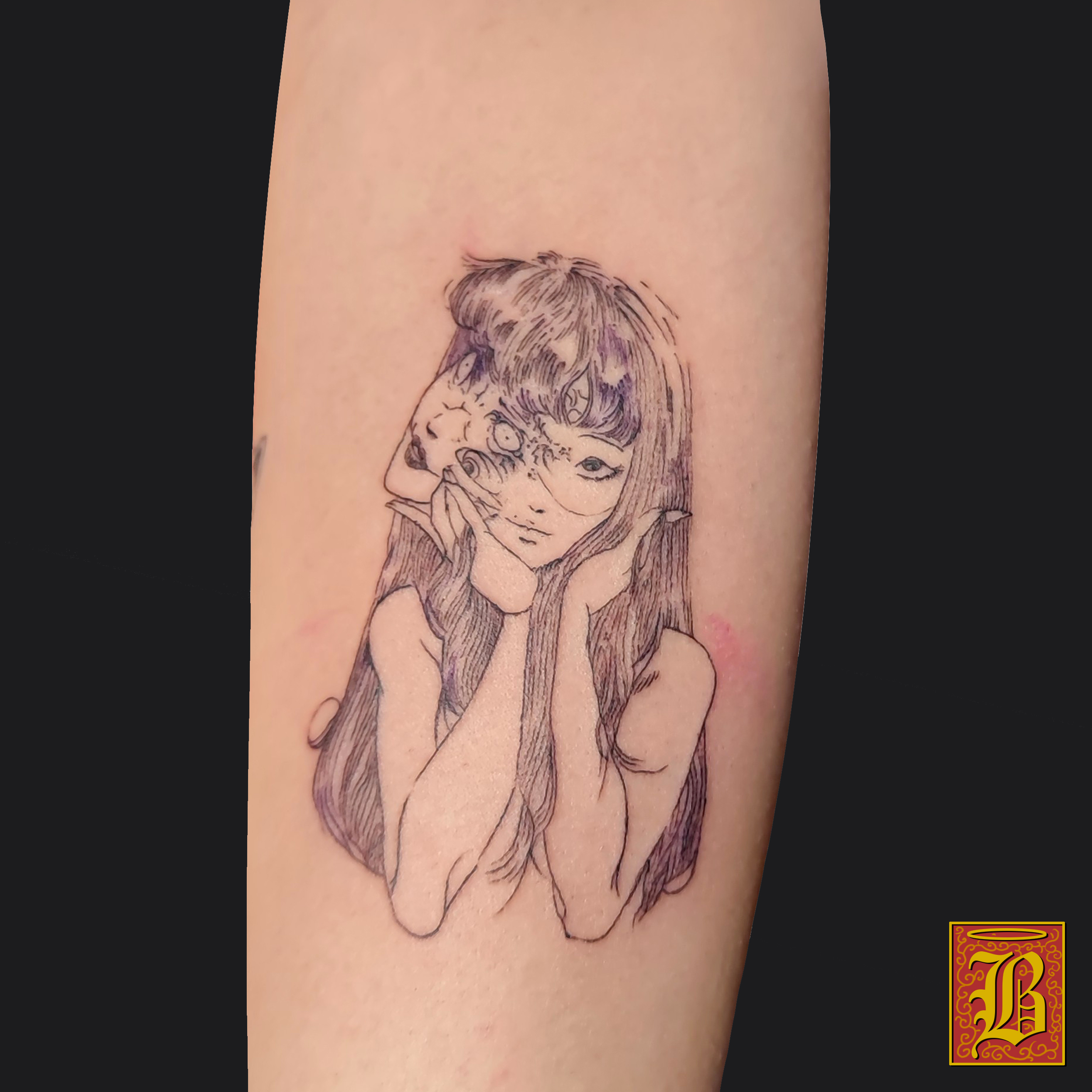 Tatouage Tomié